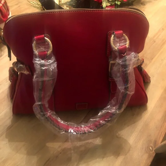 Brand new with tags Dooney & Bourke satchel purse